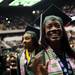 An Eastern Michigan University graduate smiles toward family and friends during the Spring Commencement on Sunday, April 28. Daniel Brenner I AnnArbor.com